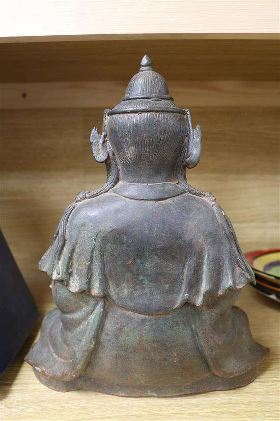 A Chinese bronze seated figure of a Buddha 29cm